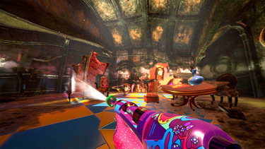 A large indoor space, covered in dirt, including a table, a room divider, and the Cheshire cat. The divider is being sprayed with a power washer.